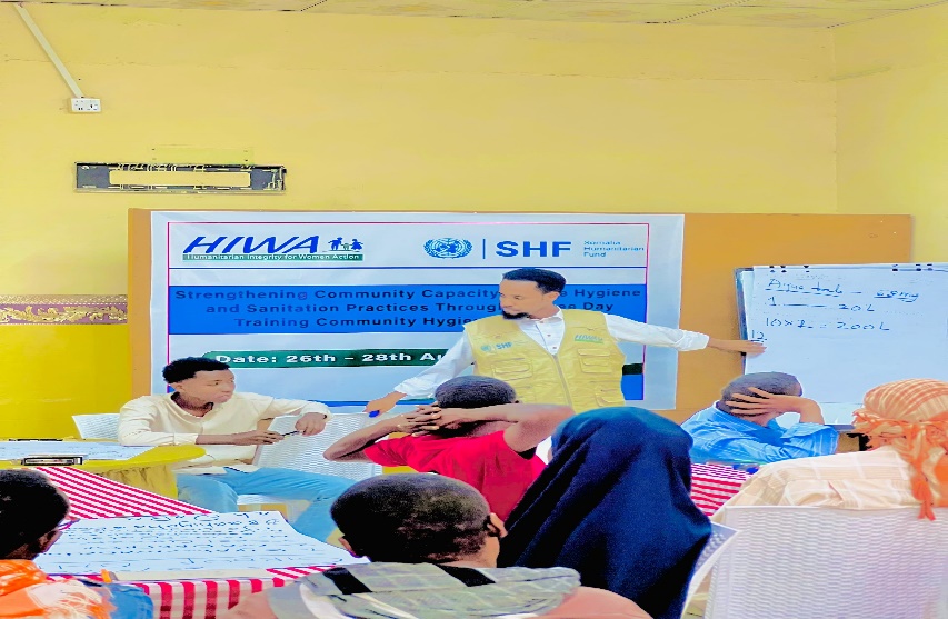 Facilitator presenting at HIWA hygiene promoter training, August 2025